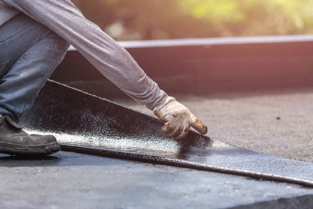 Professional Exterior Waterproofing technician working in Columbus, WI